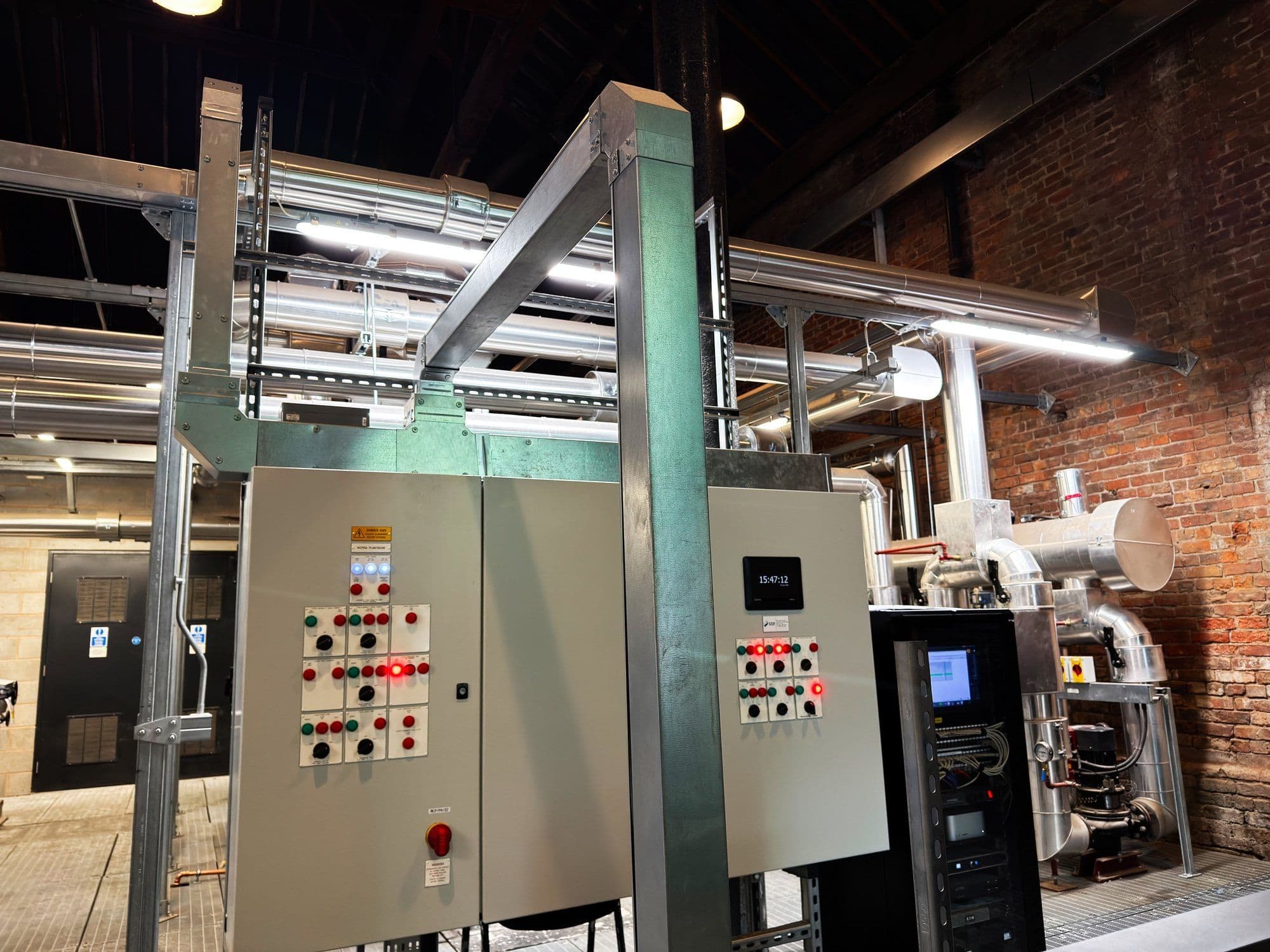 Control panels and pipework installed in a plant room