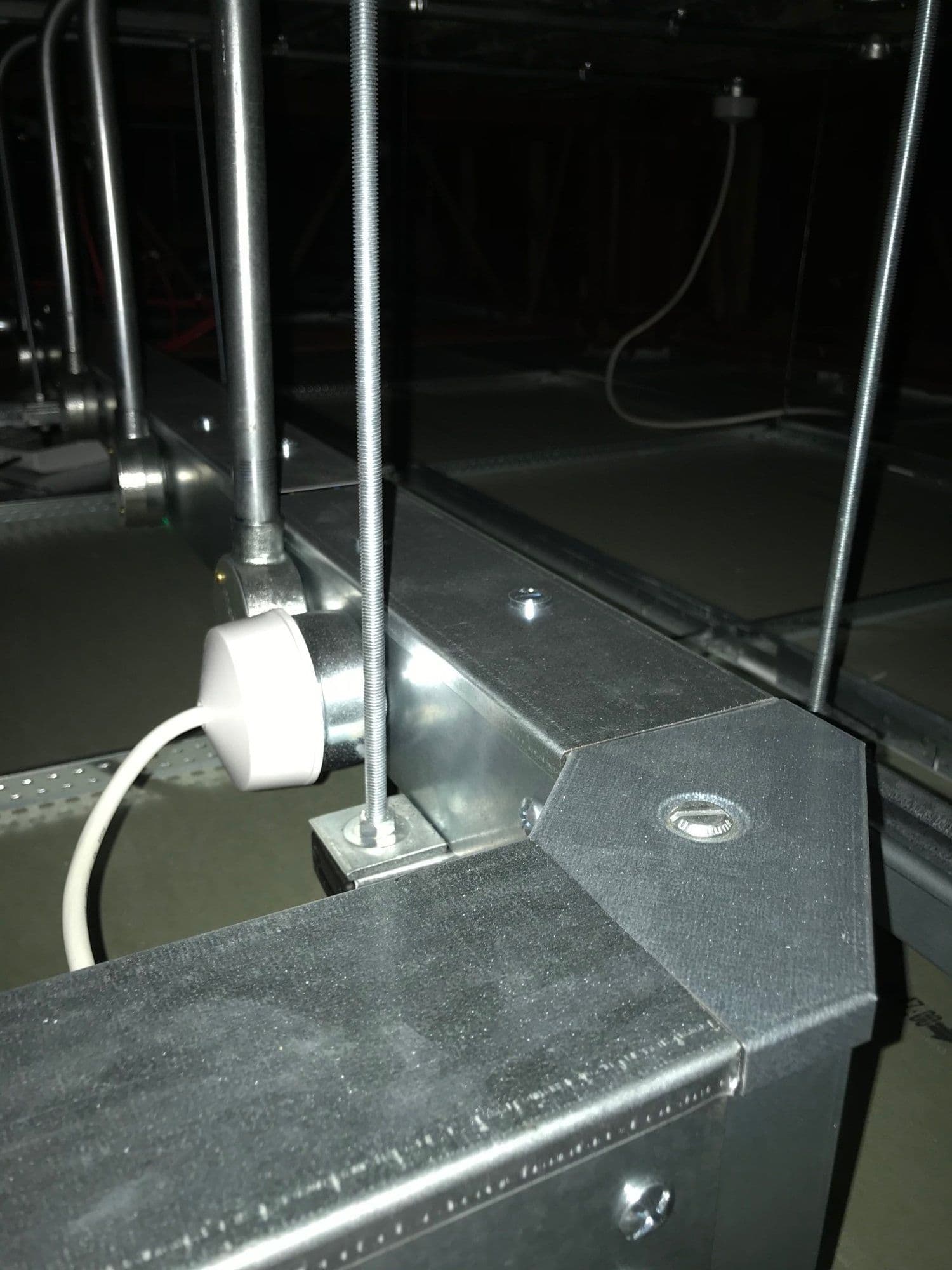 New steel cable trunking and containment fixed above a ceiling